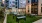 Turf courtyard with picnic tables and string lights